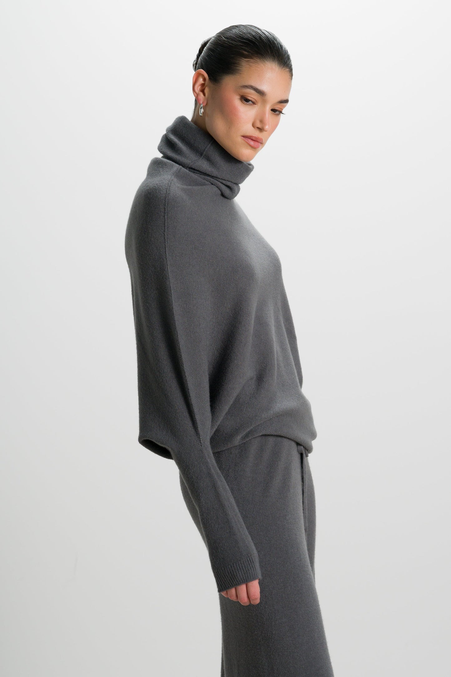 Asymmetric Draped Roll Neck | Charcoal | Seamless Knit