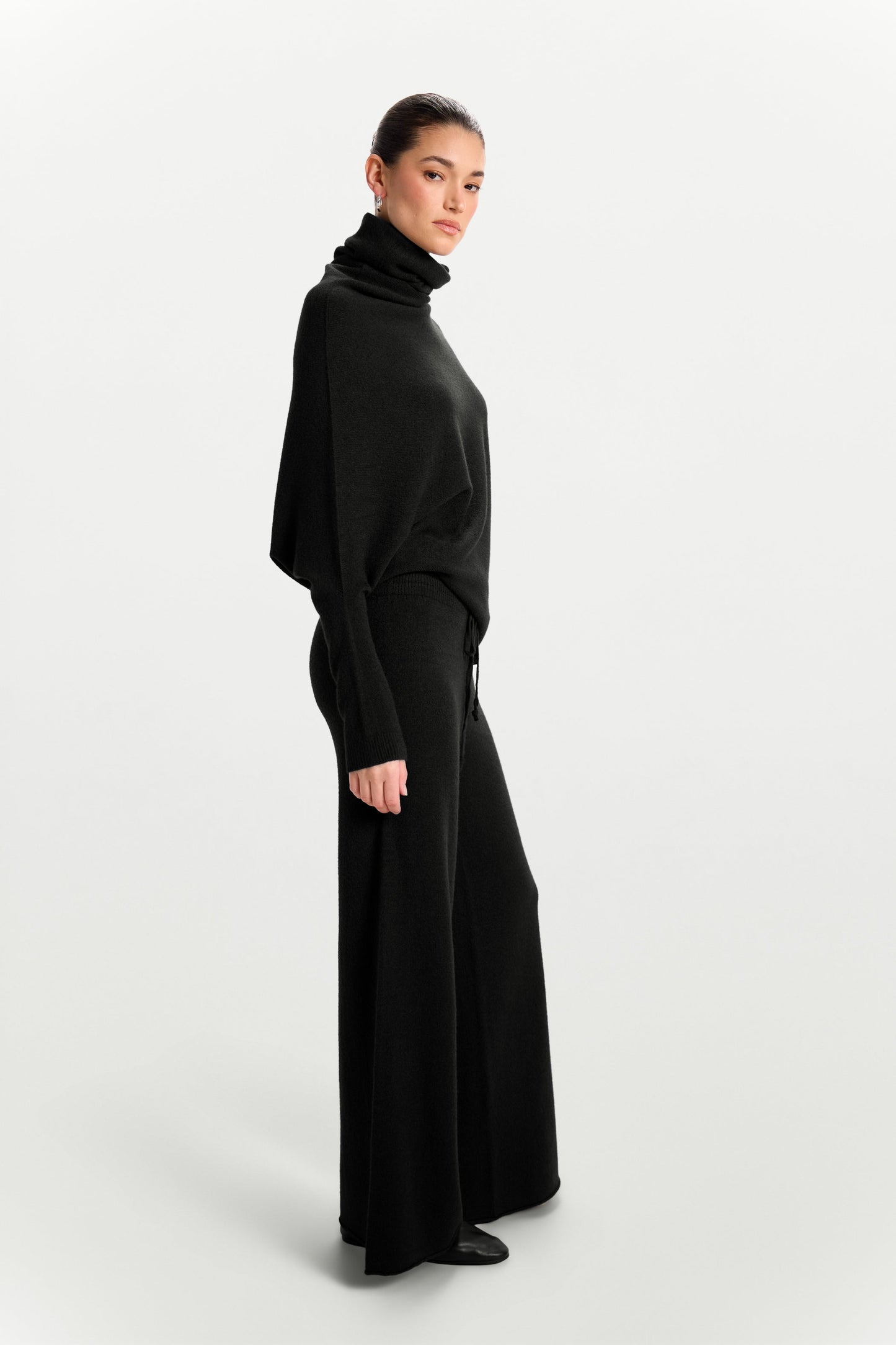 Asymmetric Draped Roll Neck | Black | Seamless Knit